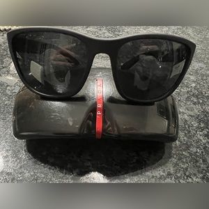 PRADA LINEA ROSSA PS O1US ACTIVE. Used. Good condition.
